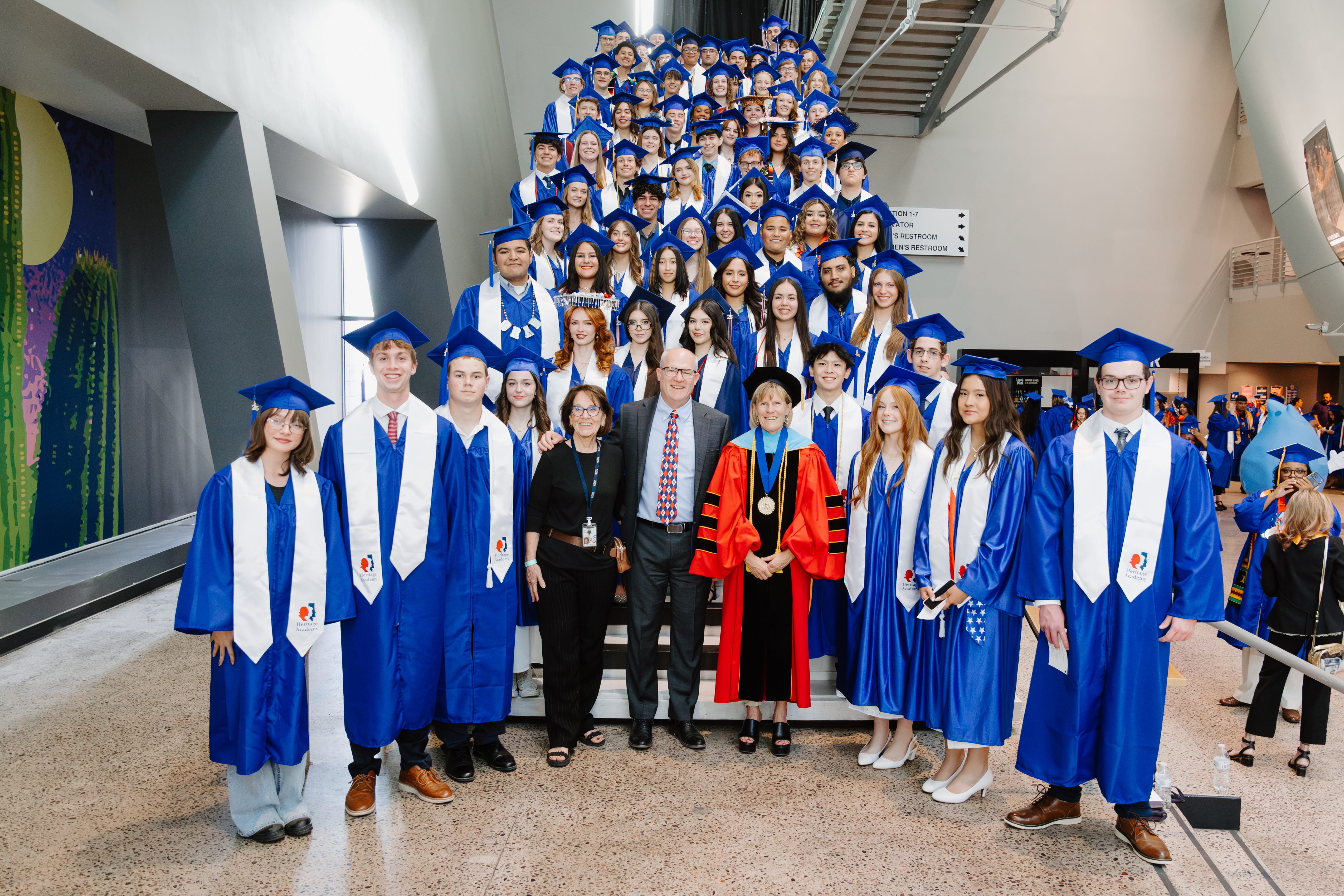 Students and faculty in caps and gowns