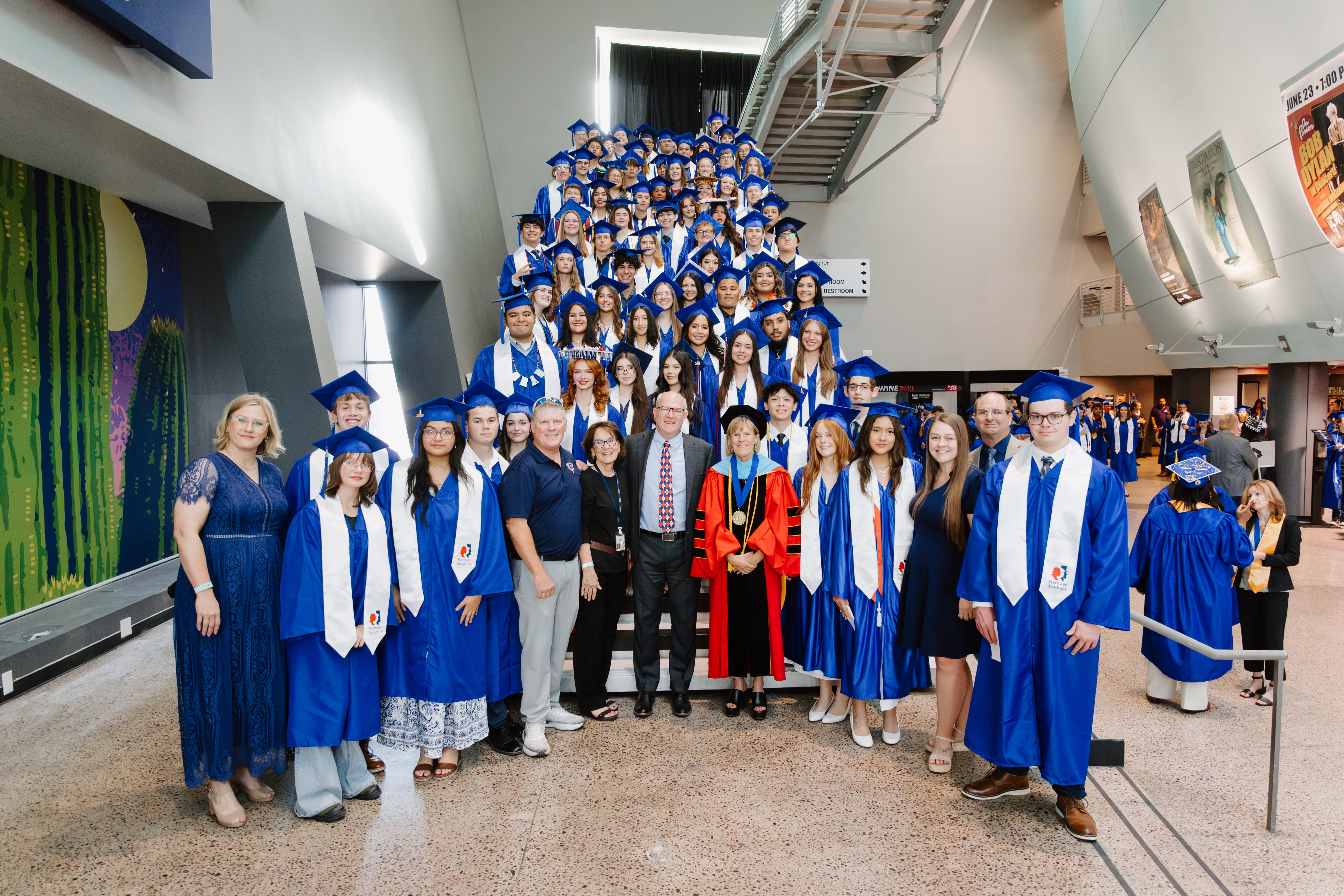 Students and faculty in caps and gowns