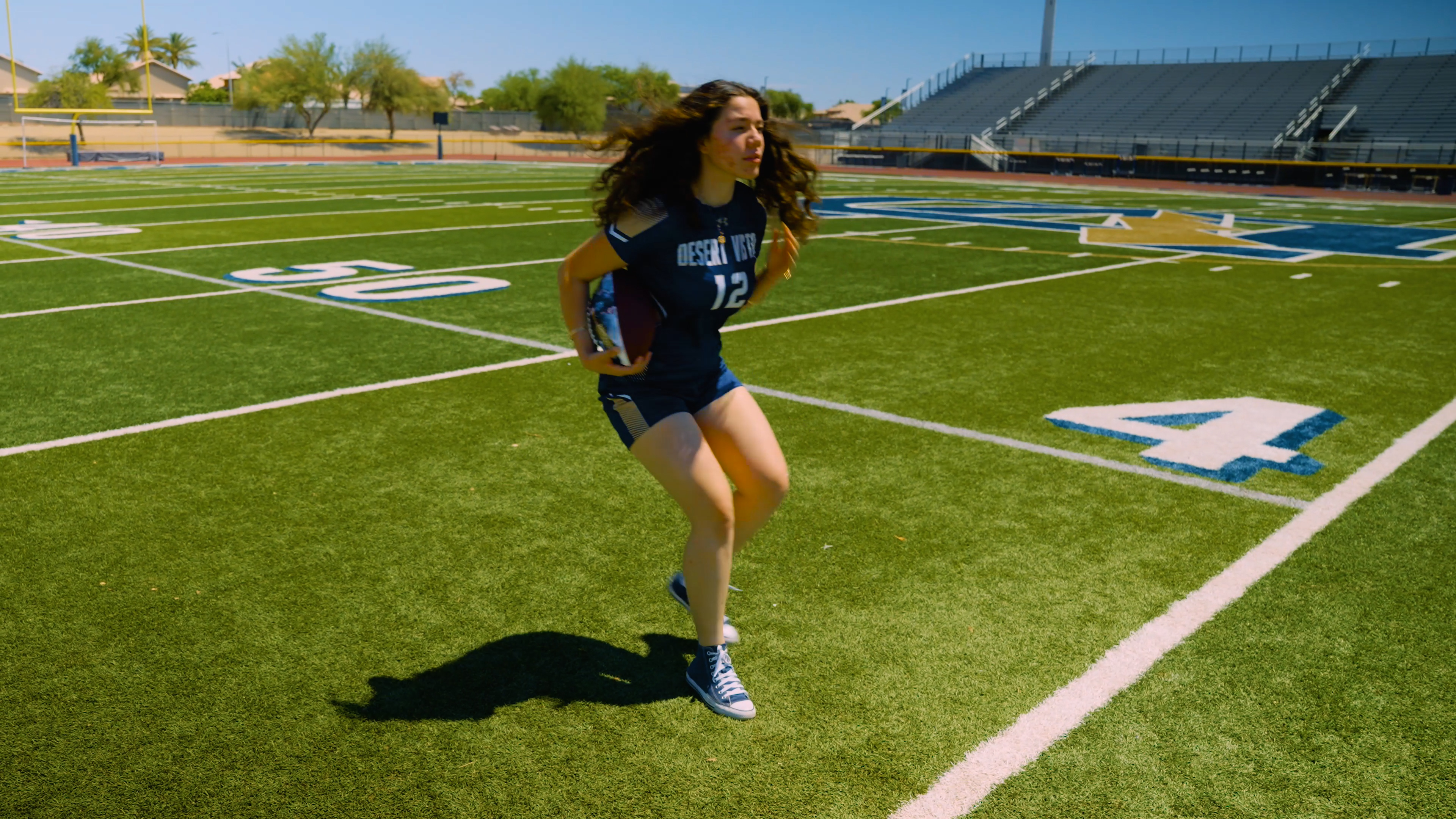 Student practicing on practice field